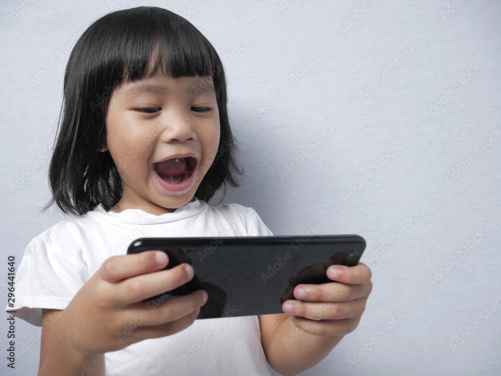 Little Girl With Smart Phone Gadget Little Girl With Smart Phone Gadget