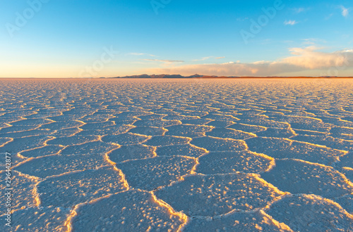 Hexagon salt formations at sunset in the Uyuni salt flat desert (Salar de Uyuni), Bolivia.