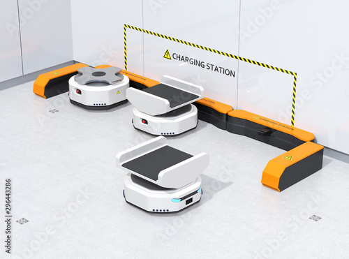 Autonomous Mobile Robots charging in modern warehouse. Warehouse automation concept. 3D rendering image. photo