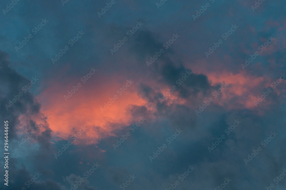 detail of orange and blue clouds in the sunset