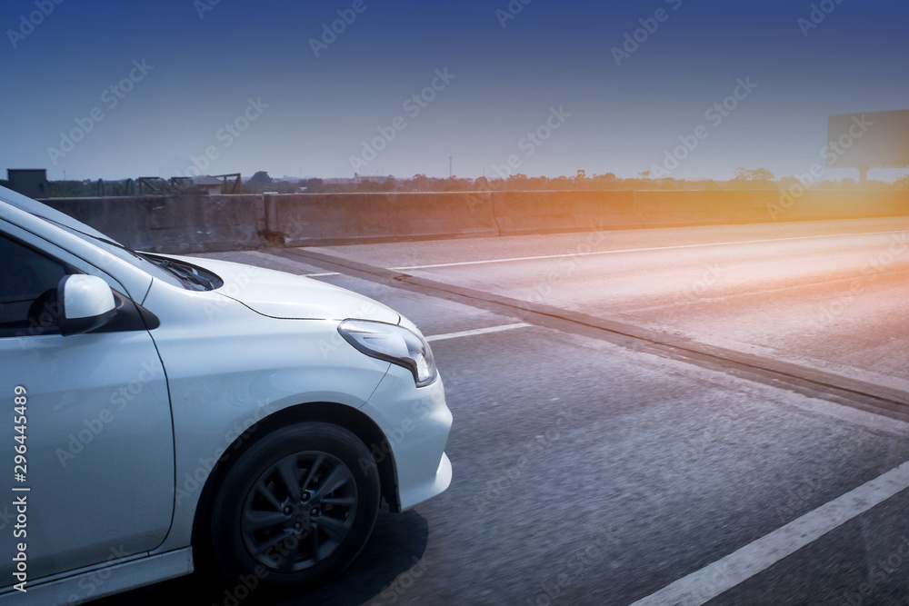 car driving on high way road  see sky view and copy spec on bottom of photo for texture concept or design