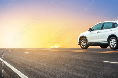 Car driving on road and sunlight background,car on road