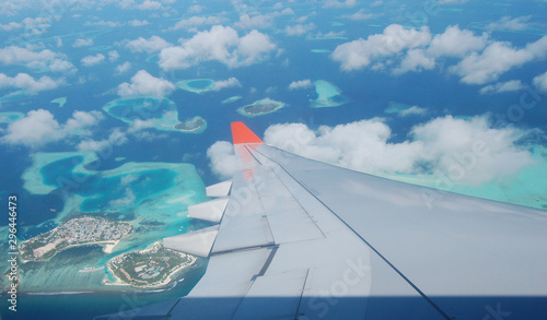 An airplane landing at the Maldive Islands
