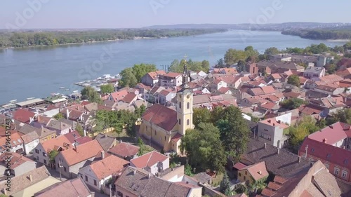 4k aerial panorama shot of Old Zemun centre with famous church, summer day photo