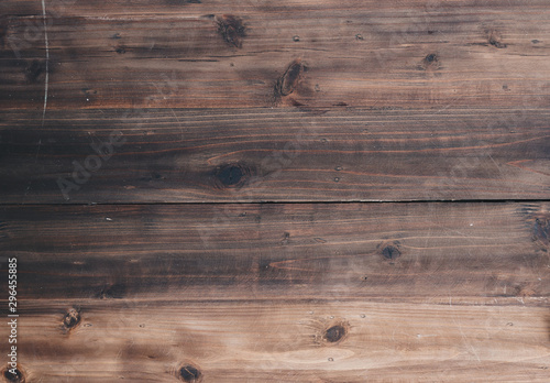 Dark texture plank wooden board top of the table in top view for wall or floor decoration.