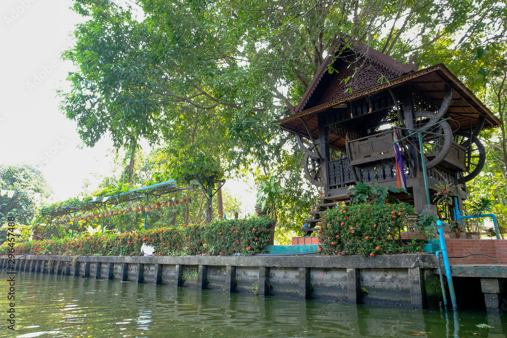 Fototapeta Chiangmai, Thailand - April 13,2018: Resting pavilion, trees and natural rivers in Thailand.