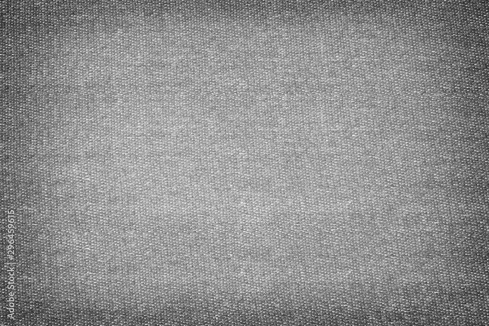 Gray jeans back pocket texture on gray denim background Gray jeans back pocket texture on gray denim background