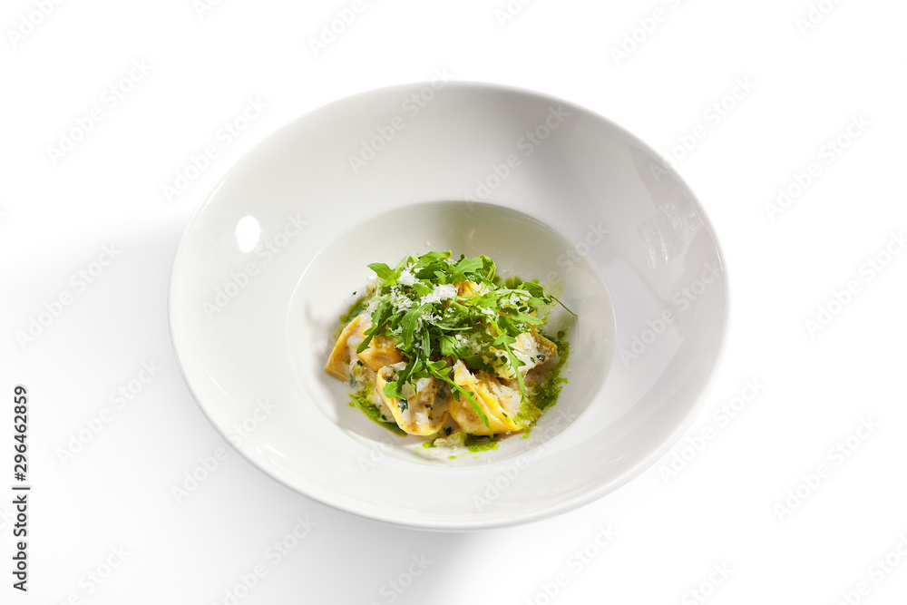 Tortellini with rabbit meat pesto sauce and arugula Tortellini with rabbit meat pesto sauce and arugula
