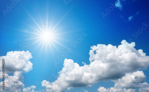 Beautiful blue sky with clouds and sun shines bright in the day