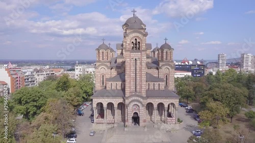 Beautiful opening 4k aerial shot of St Mark Church and Belgrade panorama in background photo