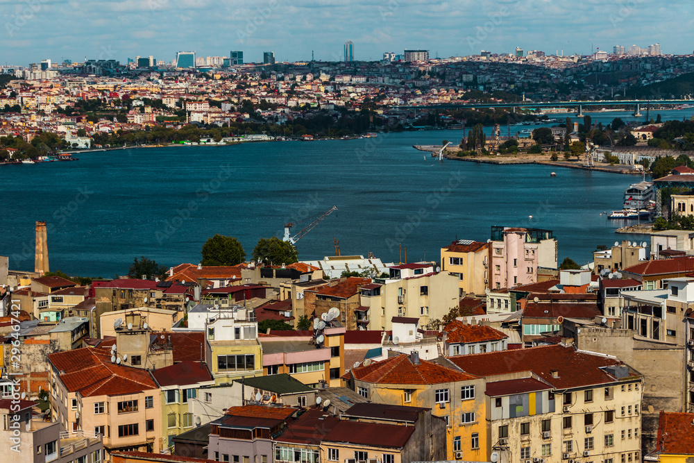 Aerial View from the Galata Tower to rows of residential buildings in a district on a bright cloudy day with vintage look on the image.