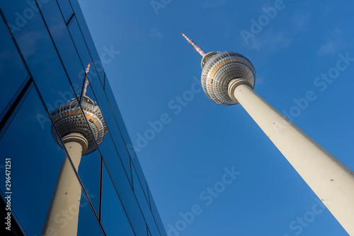 Beautiful urban reflections in the city center of Berlin, Germany, with a detail of the Tv Tower called Fernsehturm photo