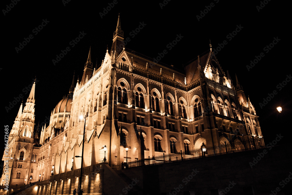 Budapest/Hungary - June 29, 2019 : Hungarian Parliament in Budapest by night, Hungary.