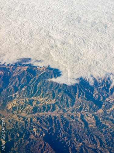 Aerial View of Cloud Blanket over Mountain Range