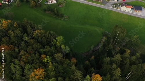 Drone flight in the evening on golden hour in beautiful Switzerland, showing the nature and village and hills and mountains of Switzerland. photo