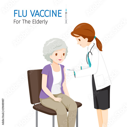 Female Doctor Injecting Flu Vaccine For The Elderly