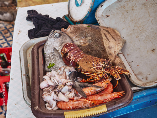 Plate full of fresh raw seafood photo