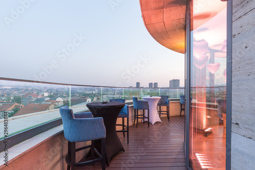 Interior of a rooftop hotel bar restaurant terrace