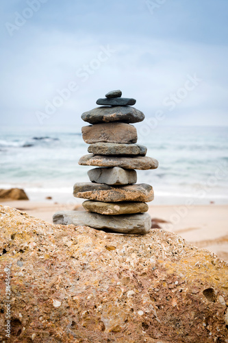 Stack of stones on the beach, Tarifa, Cadiz, Andalucia, Spain