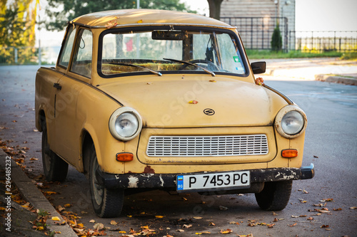 Fotografie Old yellow Trabant 601s car on the street