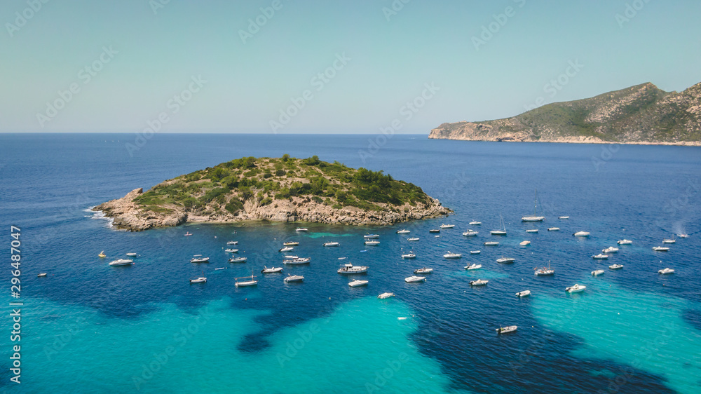 aerial view of Pantelau island with boats, Spain