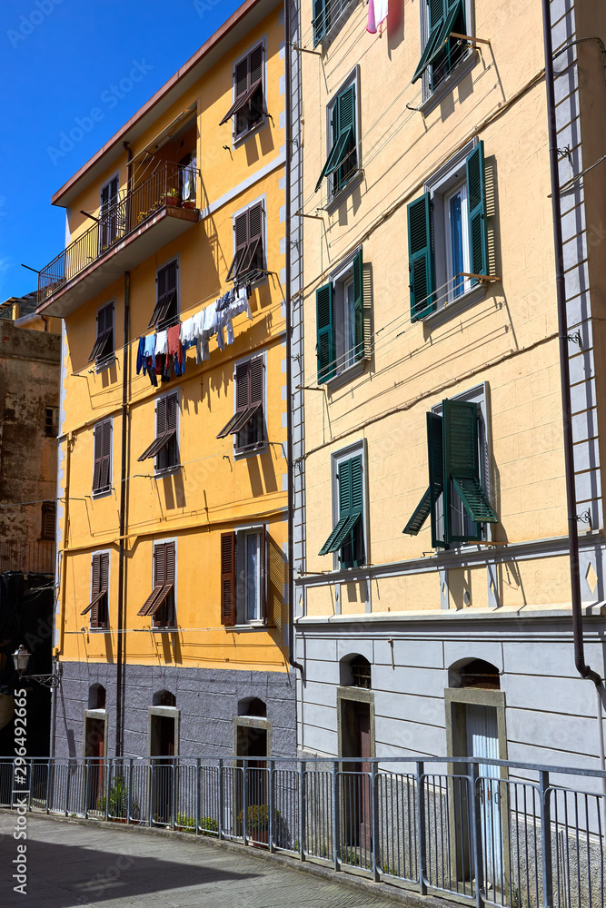 Old traditional Italian house with wooden windows and balconies in Riomaggiore, Cinque Terre, Liguria, Italy