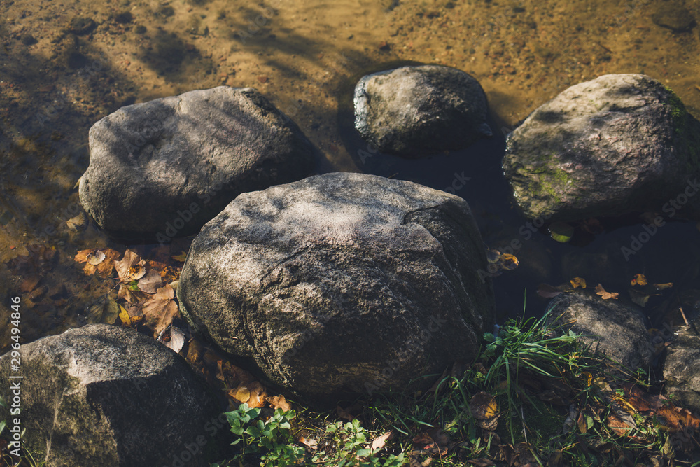stones lie on the water. autumn landscape stones lie on the water. autumn landscape