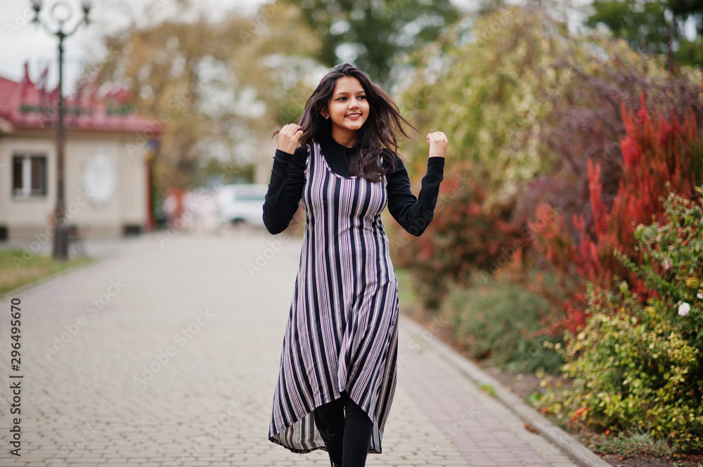 Portrait of young beautiful indian or south asian teenage girl in dress. Portrait of young beautiful indian or south asian teenage girl in dress.