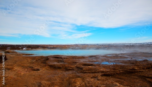 Thermal springs on Iceland with blue sky