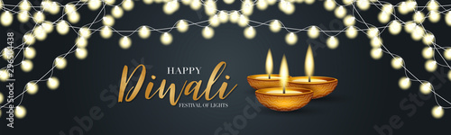 Happy Diwali - festival of lights banner or website header design. Indian traditional holiday background with glowing garland and text typography on a black backdrop. Diya oil lamp.