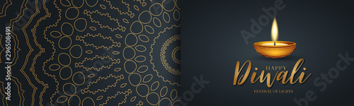 Happy Diwali - festival of lights banner or website header design. Indian traditional holiday background with Diya oil lamp and text typography on a black backdrop with golden hindu ornament. 