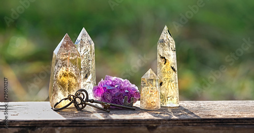 quartz and amethyst stones mineral. gemstones crystal and vintage keys on abstract nature background. gems for relaxation, quartz crystals close up. Crystal Ritual, Witchcraft. copy space
