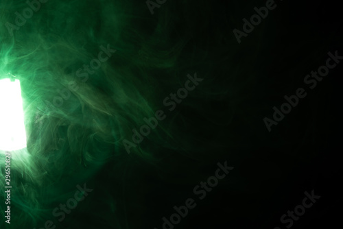 Green Smoke in the Spotlight - Abstract Background