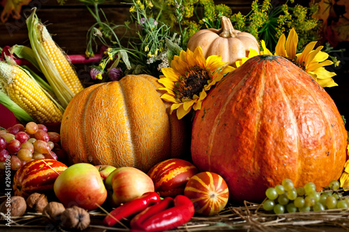 The table, decorated with vegetables and fruits. Harvest Festival. Happy Thanksgiving. Autumn background. Selective focus.