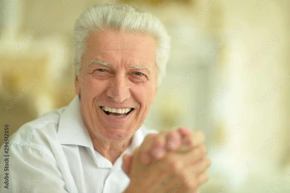 Close up portrait of smiling handsome senior man Close up portrait of smiling handsome senior man