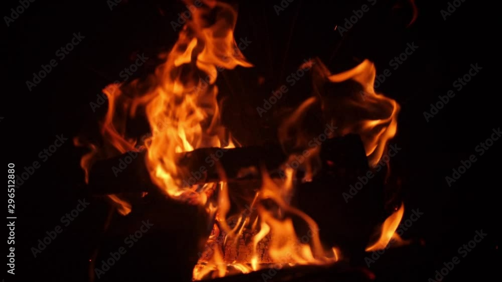 Closeup slow motion video of burning wooden logs in the traditional pizza oven Closeup slow motion video of burning wooden logs in the traditional pizza oven