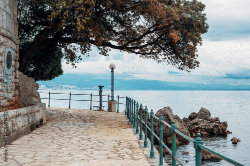 Stone path along the shore in Opatija, Croatia, Europe. No people. Holiday travel destinations around Europe.