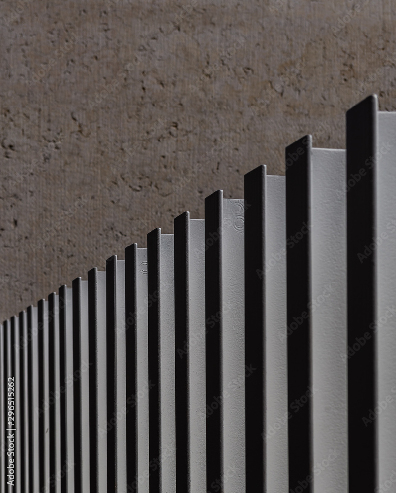 Obraz premium White painted steel bars align making a fence