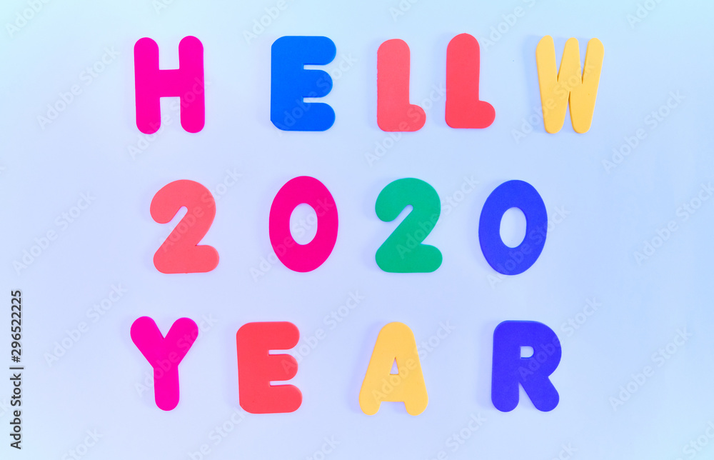 Text, Hello new year 2020, in multicolored letters on a blue background. New year greetings Text, Hello new year 2020, in multicolored letters on a blue background. New year greetings