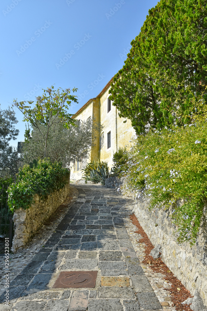 Province of Salerno, Italy, 10/13/2018. A road among the old houses of a mountain village.
