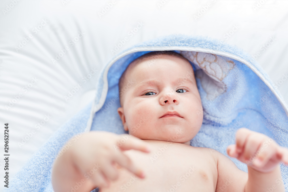 Baby looks attentive and alert Baby looks attentive and alert