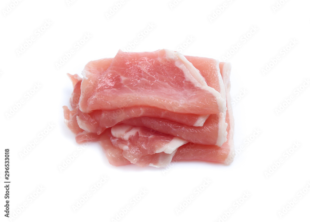 Raw pork meat with parsley herb leaves isolated on white background Raw pork meat with parsley herb leaves isolated on white background
