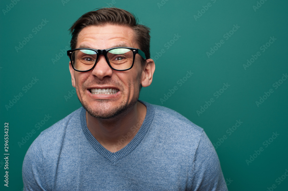 Close-up portrait of positive expressive young man Close-up portrait of positive expressive young man