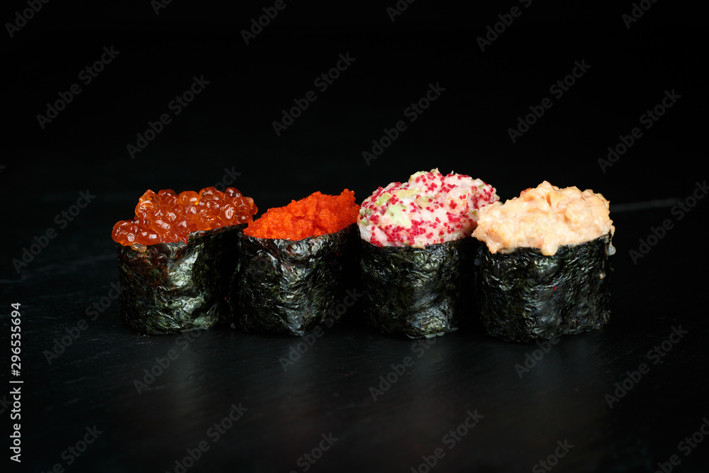 assorted gunkans with salmon, caviar, crab and avocado assorted gunkans with salmon, caviar, crab and avocado