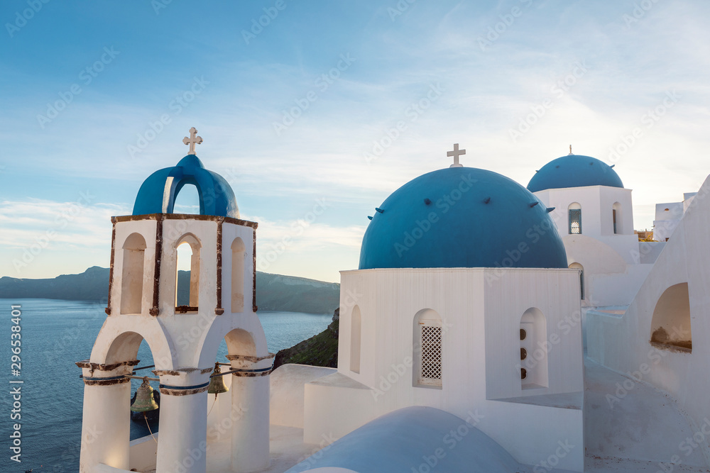 famous Santorini blue church domes in Oia