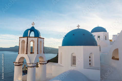 famous Santorini blue church domes in Oia