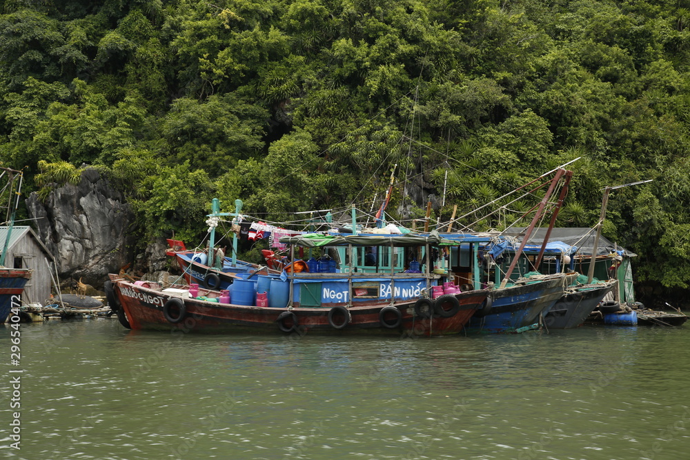 Bai Tu Long Bay, Vietnam »; August 2017: A local green fishing boat in Bai Tu Long Bay