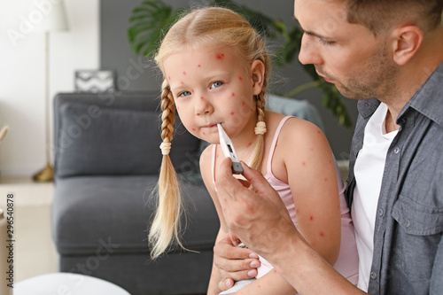 Man measuring temperature o...