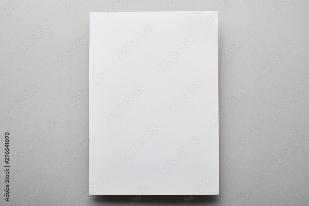 top view of empty and white paper with copy space top view of empty and white paper with copy space