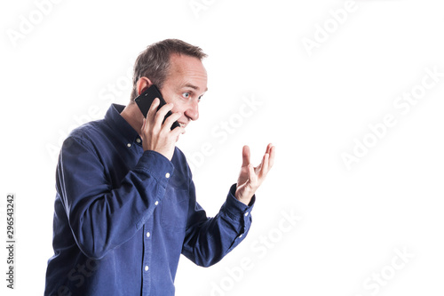 Man in casual blue shirt on white background holding emotional conversation